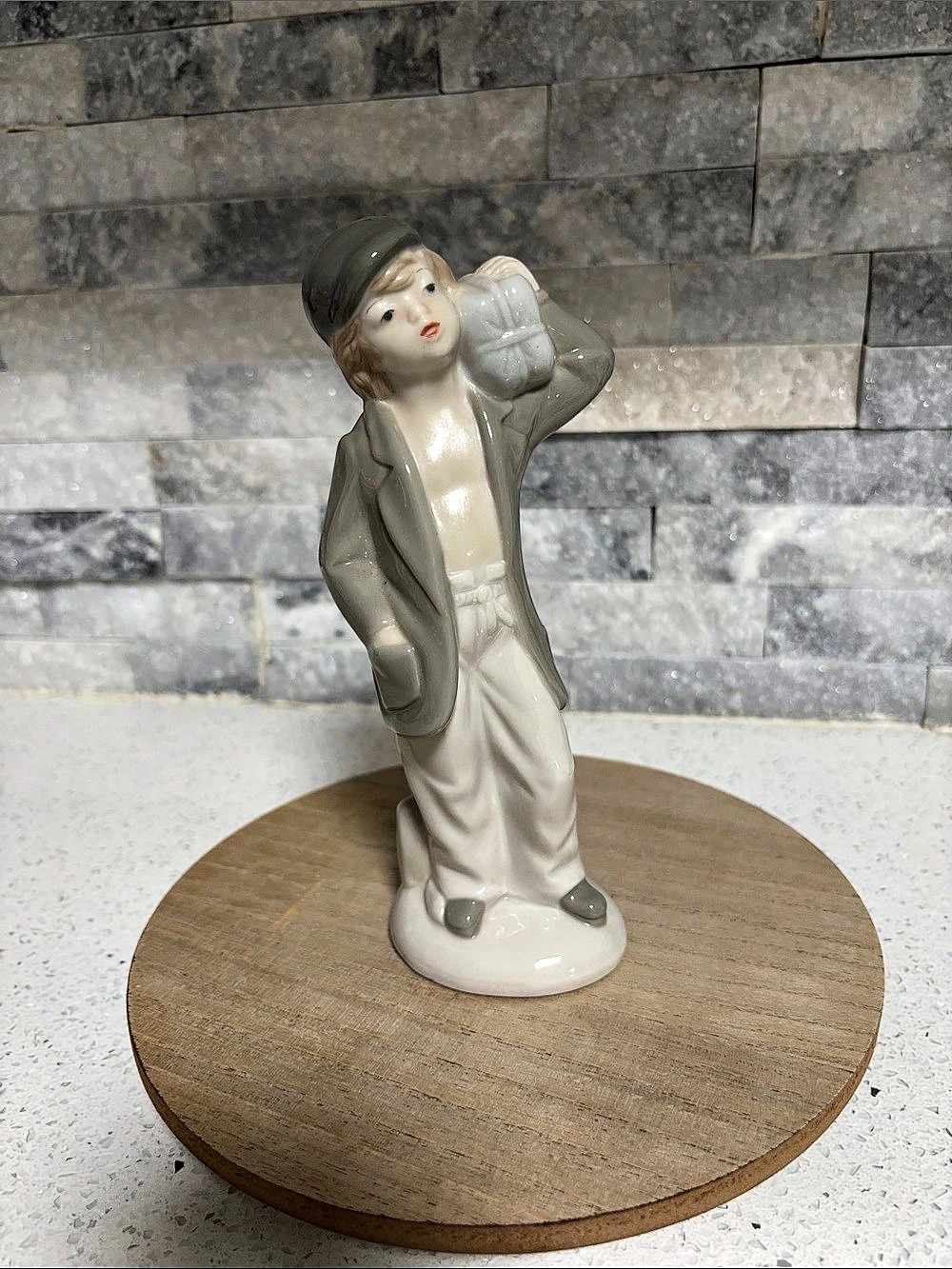 Signed Porcelain Figurine Young Boy with Sack Package White & Gray